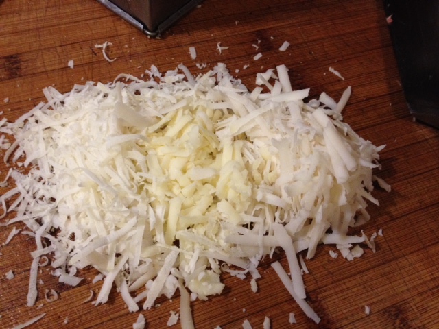 Check your refrigerator for cheese and grate about 3/4 cup. Here is a mixture of parmesan, goat gouda and jack cheeses.