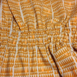 I added four rows of shirring to my Staple Dress, using elastic thread on my bobbin.