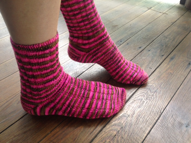 Finished ribbed socks on US 0 dons; toe up with a FLK heel and tubular bind off.