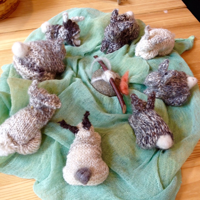 Our collection of hand-spun, hand-knit bunnies.