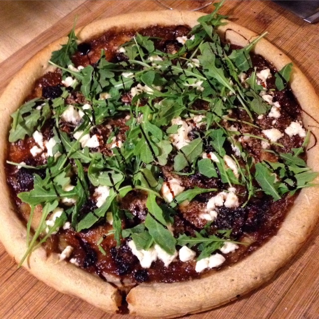 Pizza with rhubarb compote "sauce," pork belly, chèvre, arugula and balsamic reduction.