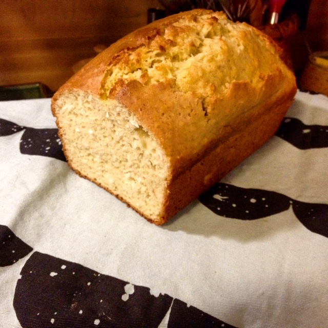 Here's my version of Coconut Quick Bread. I used a combination of coconut water and half&half in place of the milk, added one egg, and eliminated the melted butter from the recipe. 