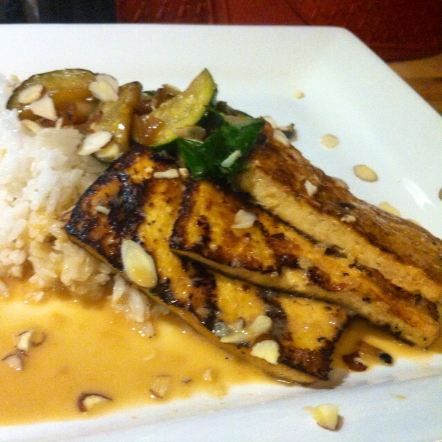 This was my first attempt at grilling tofu and it turned out very tasty. I smeared a piece of heavy-duty foil with coconut oil before grilling marinated sliced tofu. This is delicious with coconut rice and sautéed or grilled vegetables.