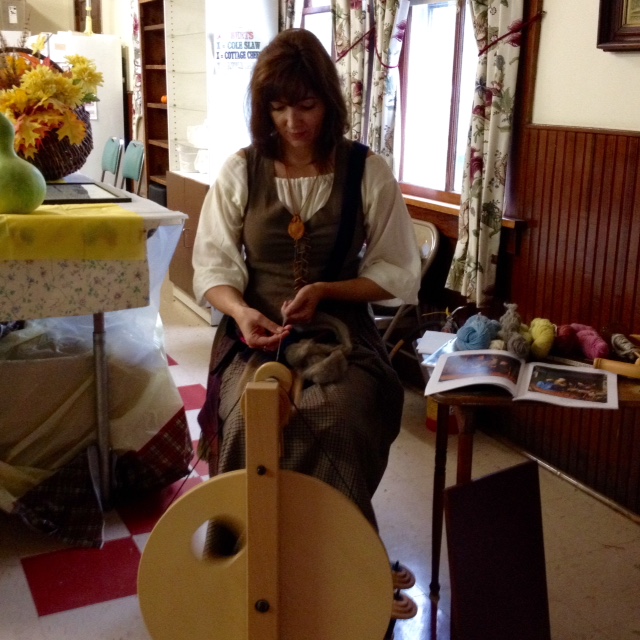 Spinning demonstration in period dress.